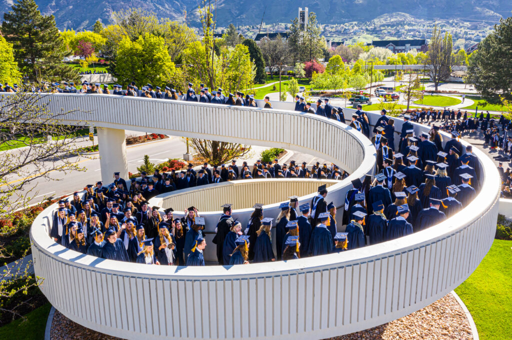 graduates walking on the spiral walkway