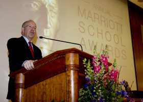 Gary Cornia, dean of the Marriott School, welcomes honorees and their family members to the annual event.