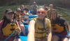 Group of students white water rafting