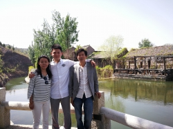 Wang with his parents in Gubei Watertown, located in Beijing. Photo courtesy of Rocky Wang.