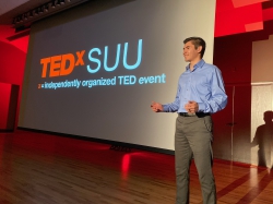 Austin Henline speaking at the TEDx SUU event