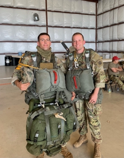 Lovejoy (pictured right) prepares for an airborne  operation with the 2-508th Parachute Infantry Regiment at Fort Bragg, North Carolina, with his friend and commander, CPT Chris Watson (pictured left). Photo courtesy of Scott Lovejoy.