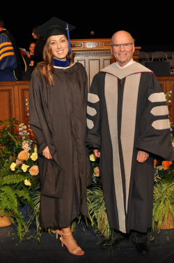 Barnard at her 2016 MBA graduation from BYU Marriott with associate Dean Michael Thompson. Photo courtesy of Miranda Barnard.