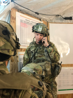 Captain Nathan Christiansen receives contact reports at the Joint Multinational Readiness Center in Germany. Photo courtesy of Nathan Christiansen.
