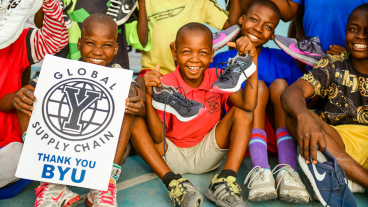 Children in Minna receive their shoes. Photo courtesy of Timeout4Africa.