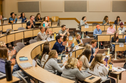 The 2022 Bateman Award winners with Elder Bateman (front row, left center) and Brigitte Madrian, dean of BYU Marriott (front row, right center).