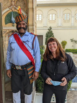 Smith with a doorman in Jaipur, India. Photo courtesy of Lucy Smith.