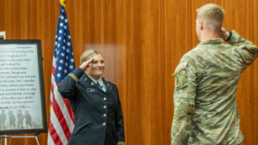 McKenna Brown giving her first salute as a second lieutenant in the United States Army. Photo courtesy of Dave Jungheim.