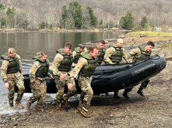 BYU Army ROTC team works together to complete the Zodiac boat event during the competition. Photo courtesy of Sarah Windmueller.