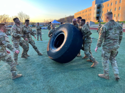 BYU Army ROTC team conducts the tire flip event at the “Functional Fitness” station during the competition. Photo courtesy of Sarah Windmueller.