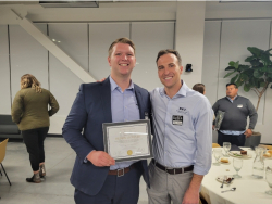 BJ Allen and his student, Dustin Leonard, winning an award at a sales event at Podium. Photo courtesy of BJ Allen.