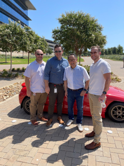 Joe Bodily with his co-workers and global president of Toyota—Akio Toyoda. Photo courtesy of Joe Bodily.