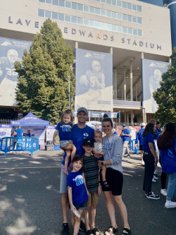 Dyer with his family at LaVell Edwards Stadium. Photo courtesy of Travis Dyer.