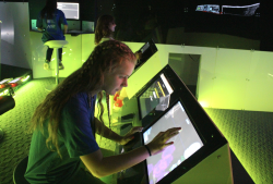 A camper uses the starship simulator at BYU's cybersecurity camp. Photo courtesy of Justin Giboney.