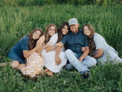Hubbs (center) with her three daughters and husband, Kade. Photo courtesy of Sara Hubbs.