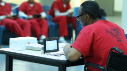 Incarcerated learner utilizing Edovo's educational resources.