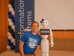 Professor Schuetzler and Penny the Robot