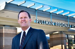 Scott Adams in front of the new Pullman Regional Hospital.