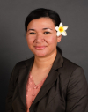 A Polynesian woman with a flower in her hair