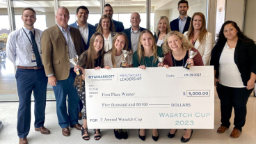 Wasatch Cup winners hold their cash prize.