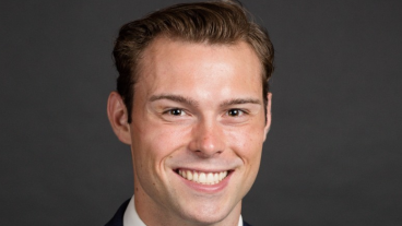 Professional headshot of a male business student.
