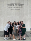 Six ExDM students pose for a picture outside the Church Office Building