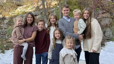 Bednar poses for a family photo with his wife and children.