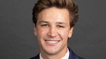 A professional headshot of Tyler Anderson.