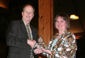 Gibb Dyer, professor of entrepreneurship and academic director of the BYU Economic Self-Reliance Center, presented Joan Dixon with the 2008 Dyer Distinguished Alumni Award.