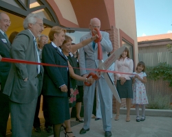 Senator Robert F. Bennett cutting the ribbon for the Suazo Business