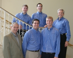 Front: Mark Chain, national director of recruiting and human resources management at Deloitte, Jaron Wilde, and John Werlhof. Back: Paul Rasmussen, Chad Hungerford, and Robert L. Gardner.